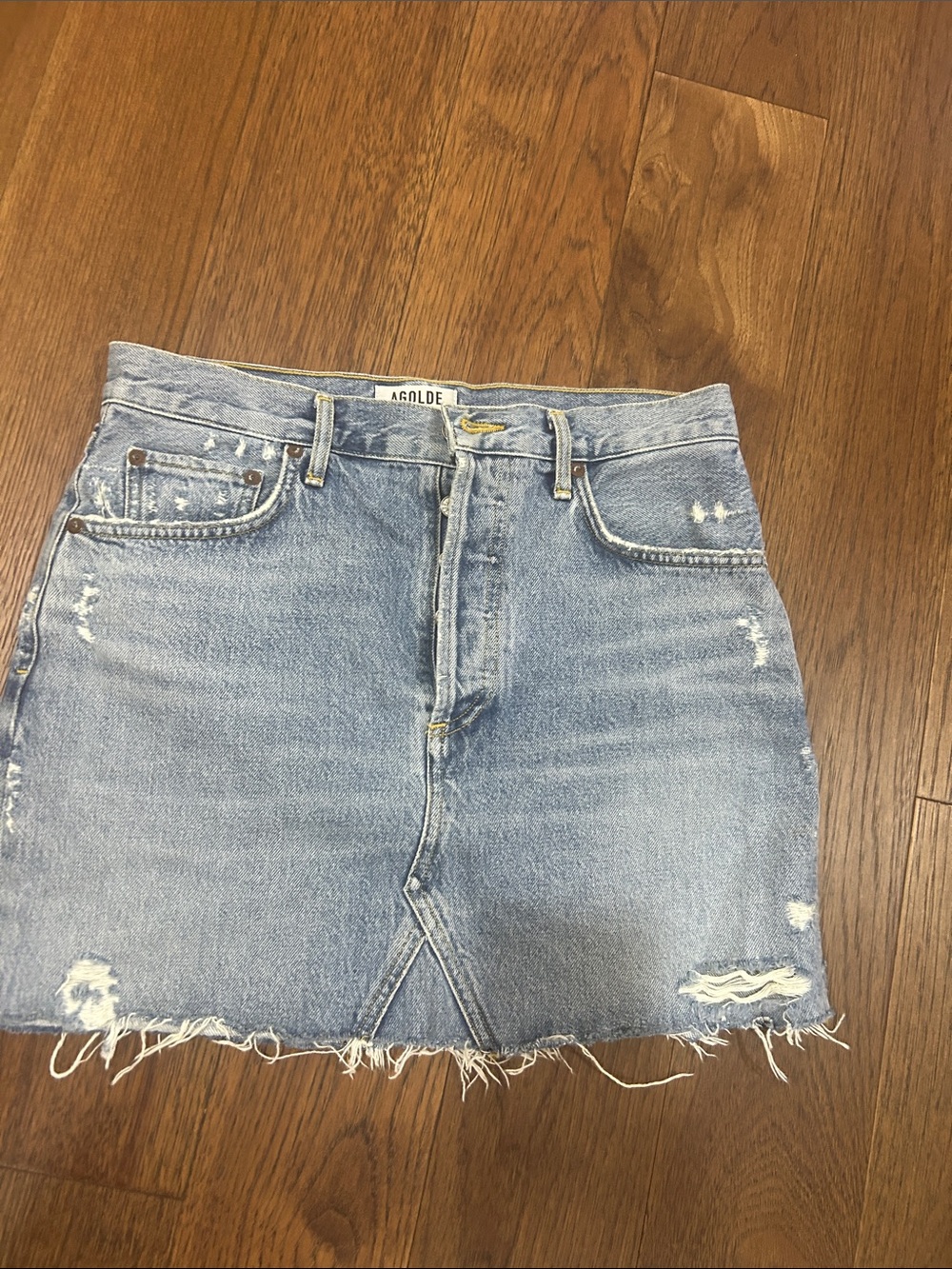 Agolde Light Wash Distressed Denim Mini Skirt
